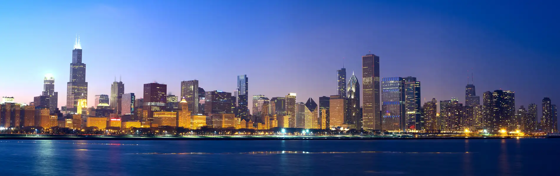 Neon color image of a band playing and people singing along