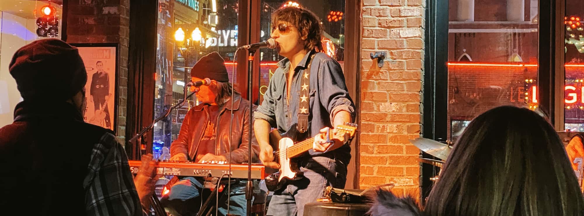 bar singer on guitar in Chicago